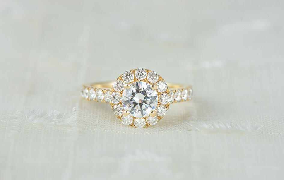 A picture of a diamond ring on the front side